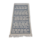 Handmade white and blue ethnic carpet