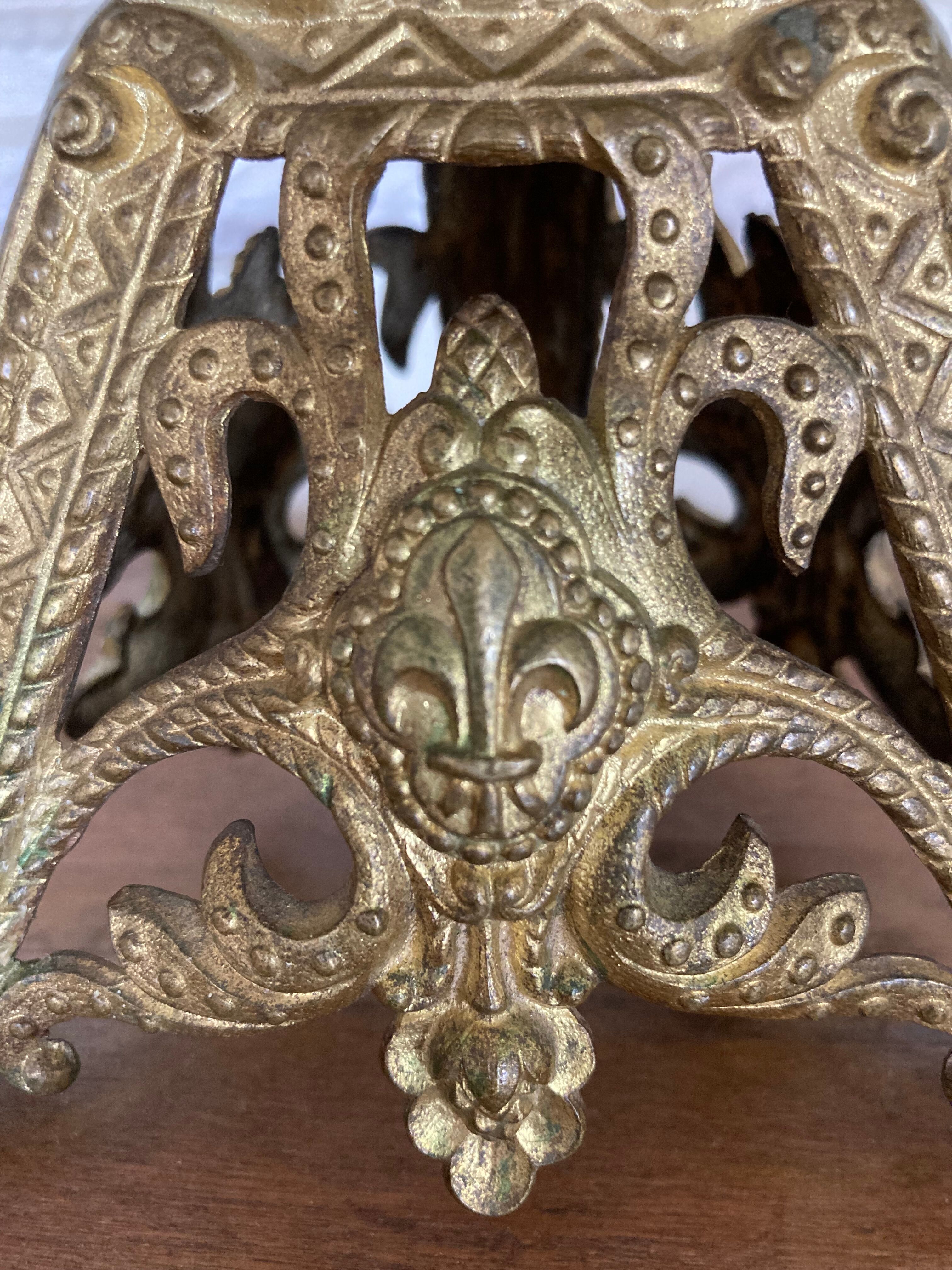 Candle holder church in gilded metal