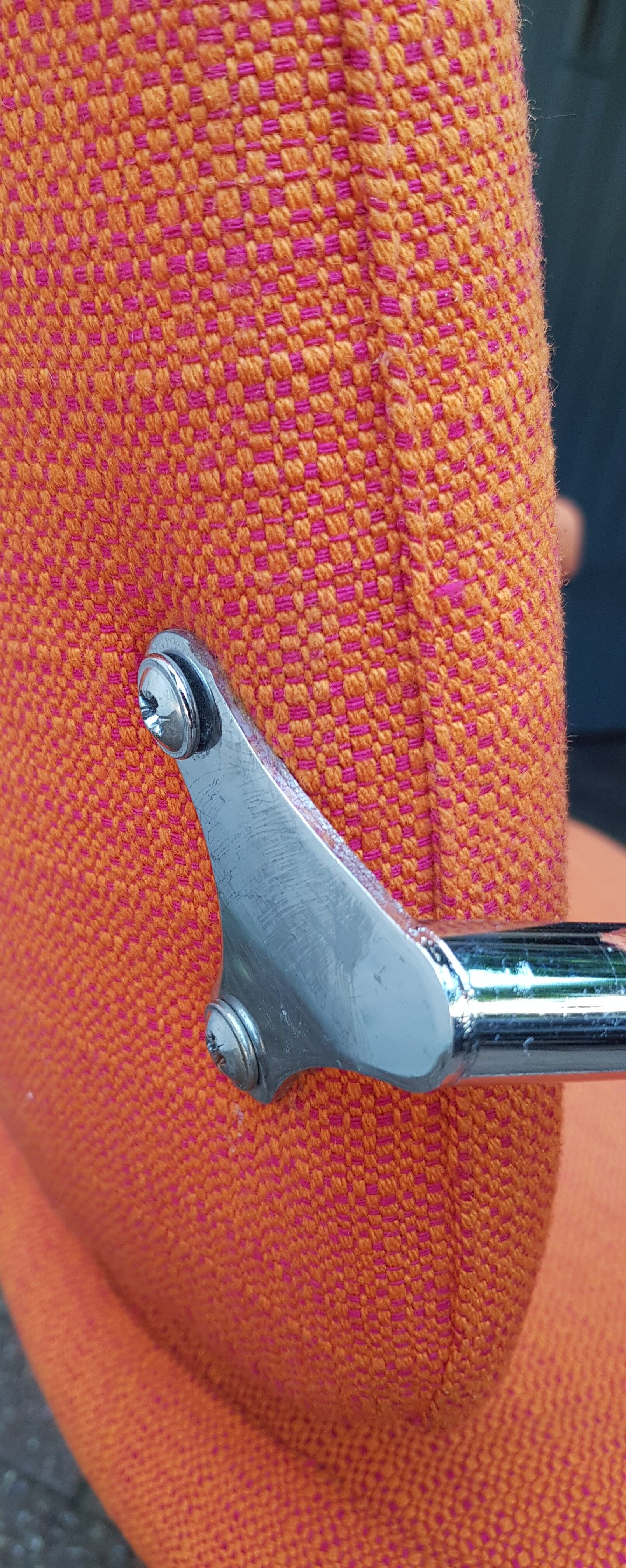 Orange fabrics and chrome armchair 70