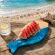 Wave-shaped serving board for fish