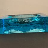 Ashtray paved in blue glass