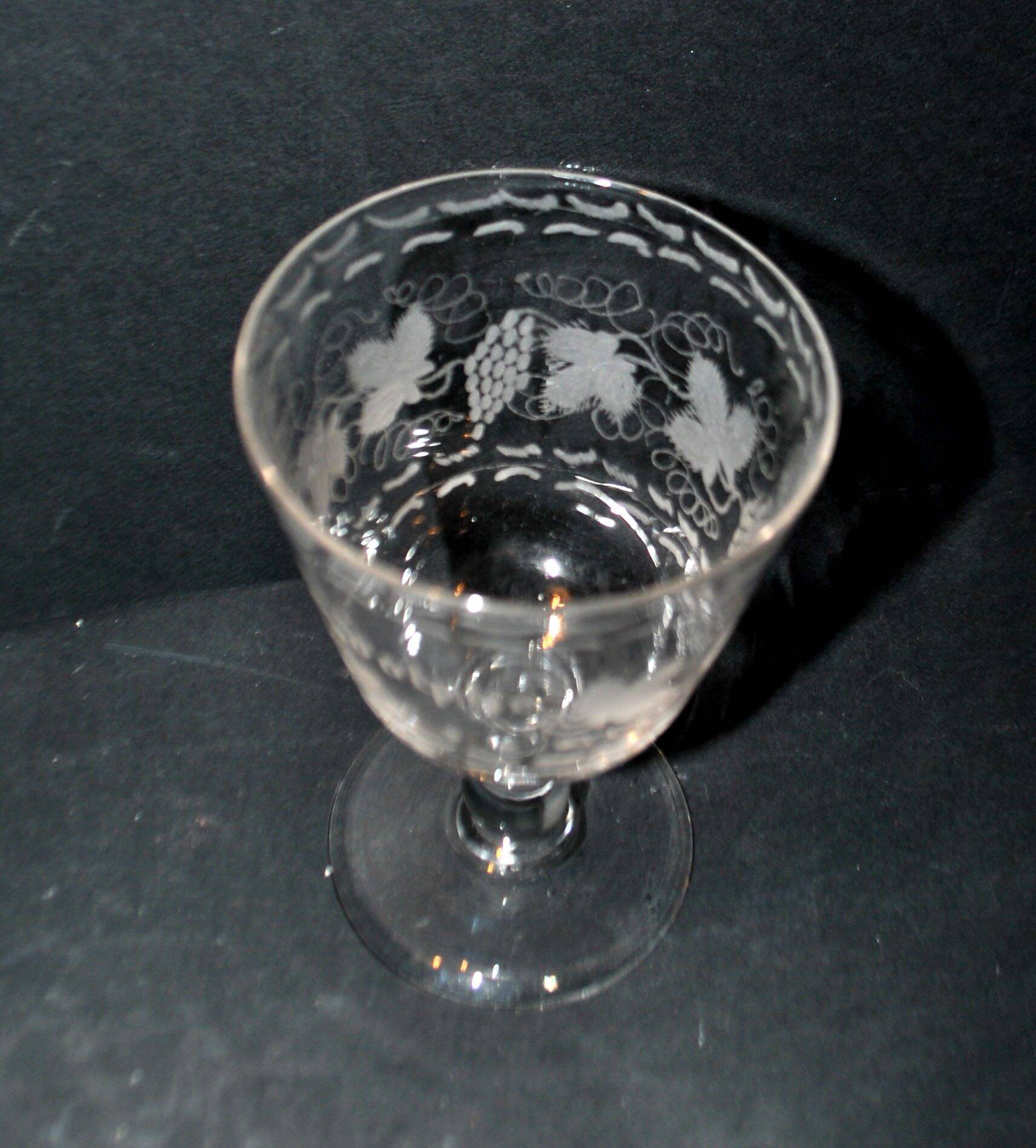Antique souvenir glass tumbler engraved with the name Adolphe