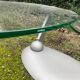 Design coffee table Naos in tempered glass and cast iron.