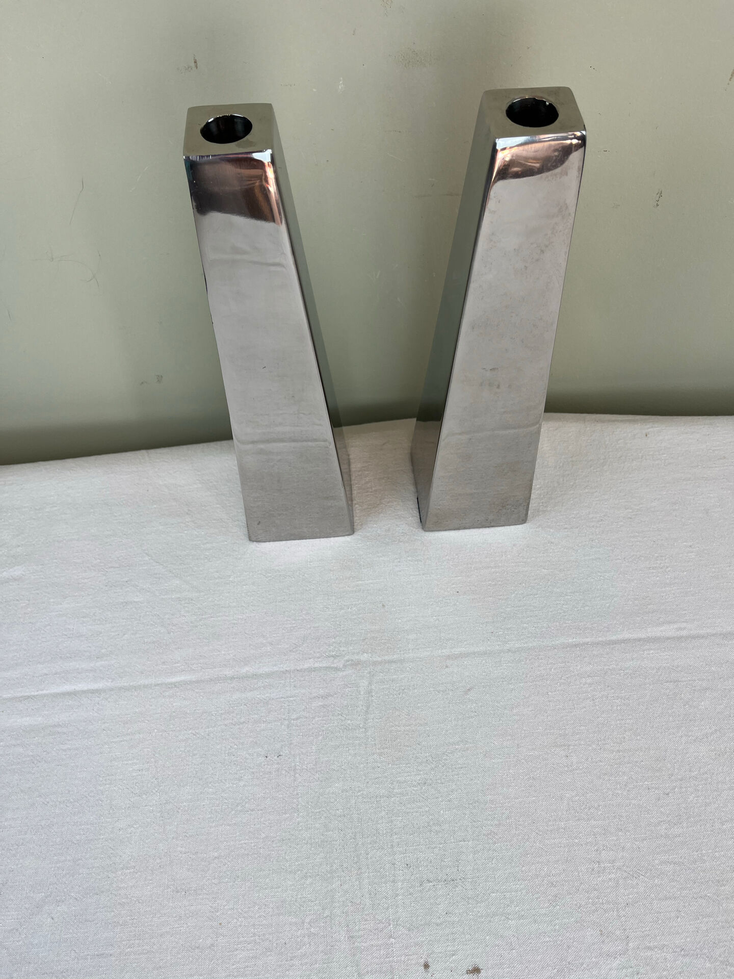 Pair of chrome metal candlesticks