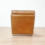 70s lounge chair in camel leather
