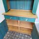 Rustic dresser with floral decor