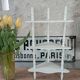 White lacquered corner shelf.