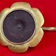 antique hand candlestick known as a rat of the cellar in bronze art Pipe