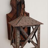 Wall lamp in wrought iron and old wood