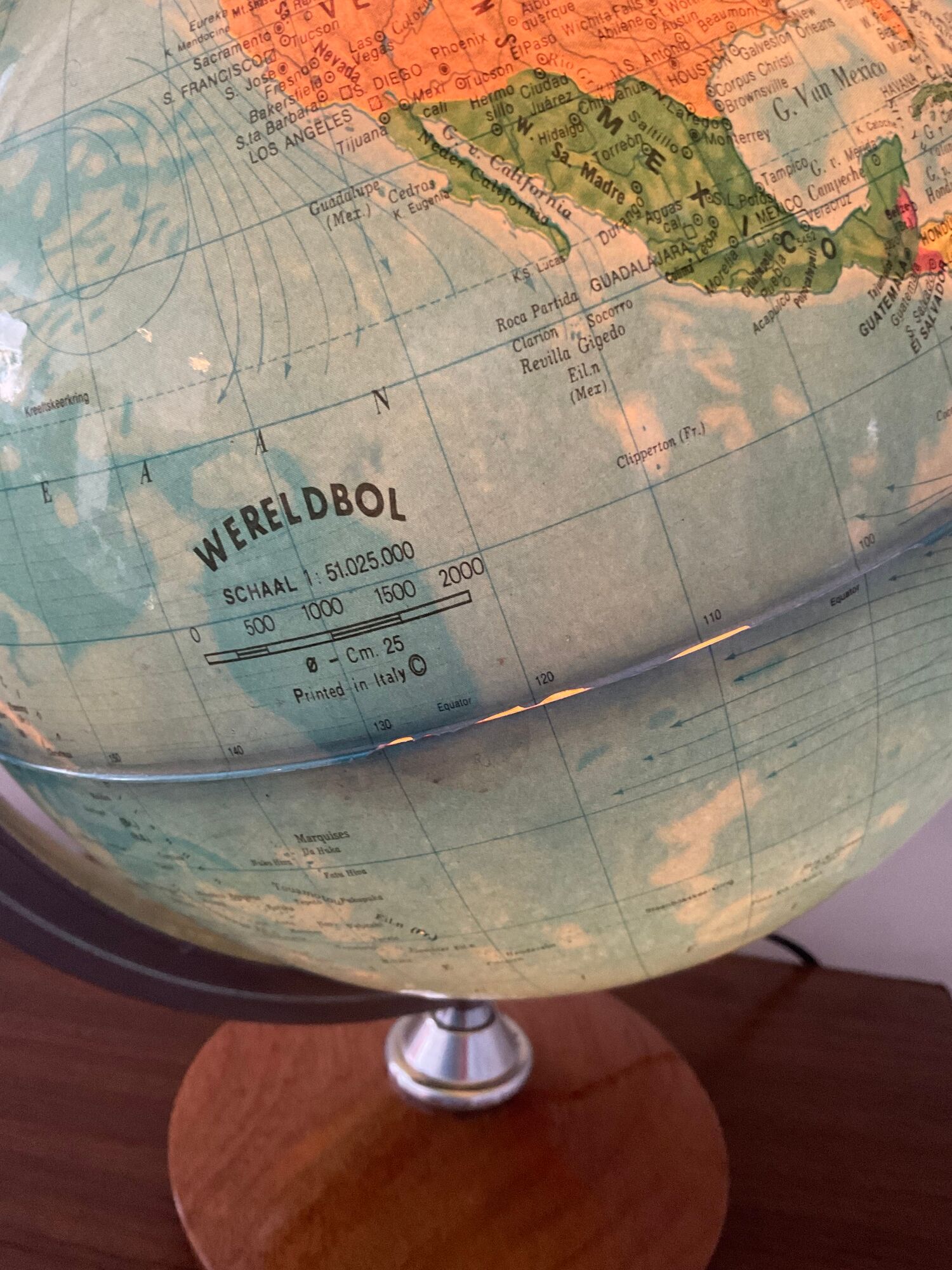Bright vintage world map with wooden foot