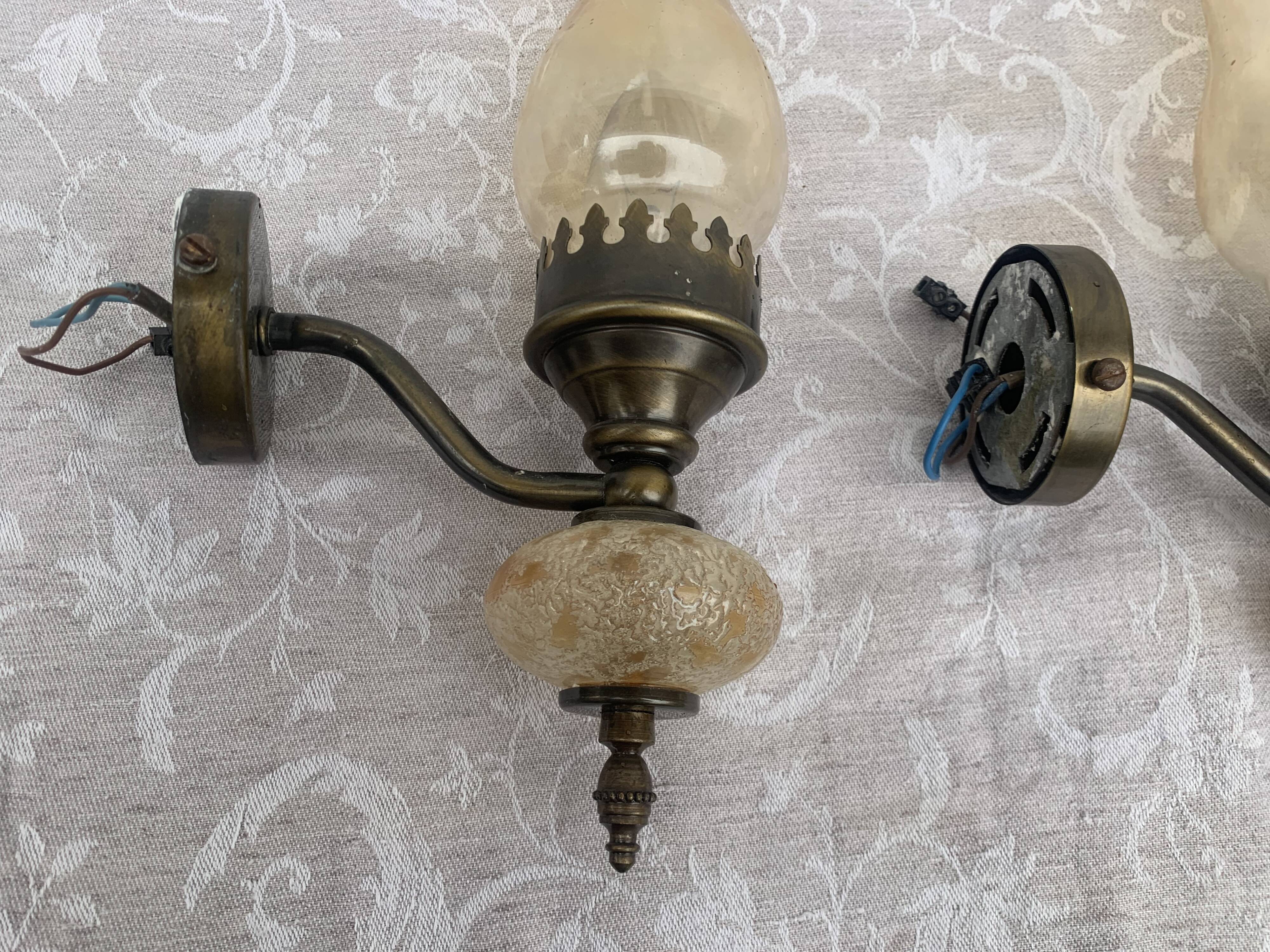 Matching pair of bronze wall sconces oil lamp style