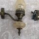 Matching pair of bronze wall sconces oil lamp style