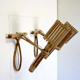 Pair of Louis Sognot rattan sconces