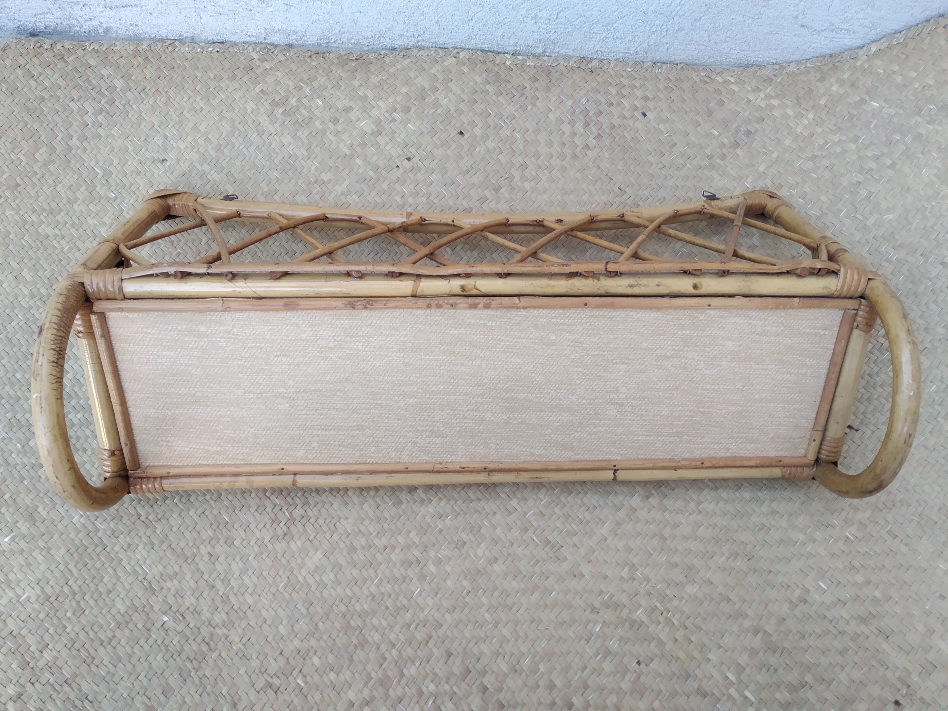 Rattan wall shelf from the 60s