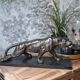 Bronze patinated panther on a black marble base – French work from the 20th century.