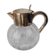 Lemonade and orangeade pitcher with ice reserve.