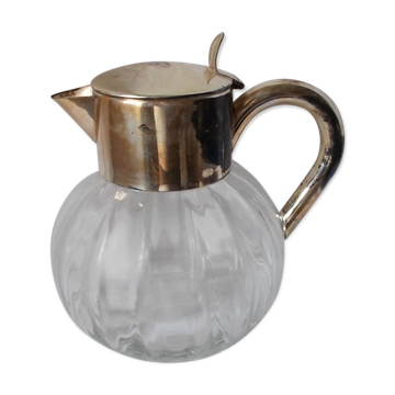 Lemonade and orangeade pitcher with ice reserve.