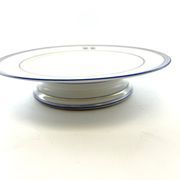 Compotier or flat cut with monogrammed white biscuit cake