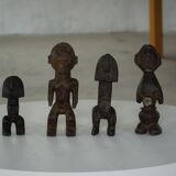 Set of 4 decorative handcrafted African wooden sculptures, mid-century.