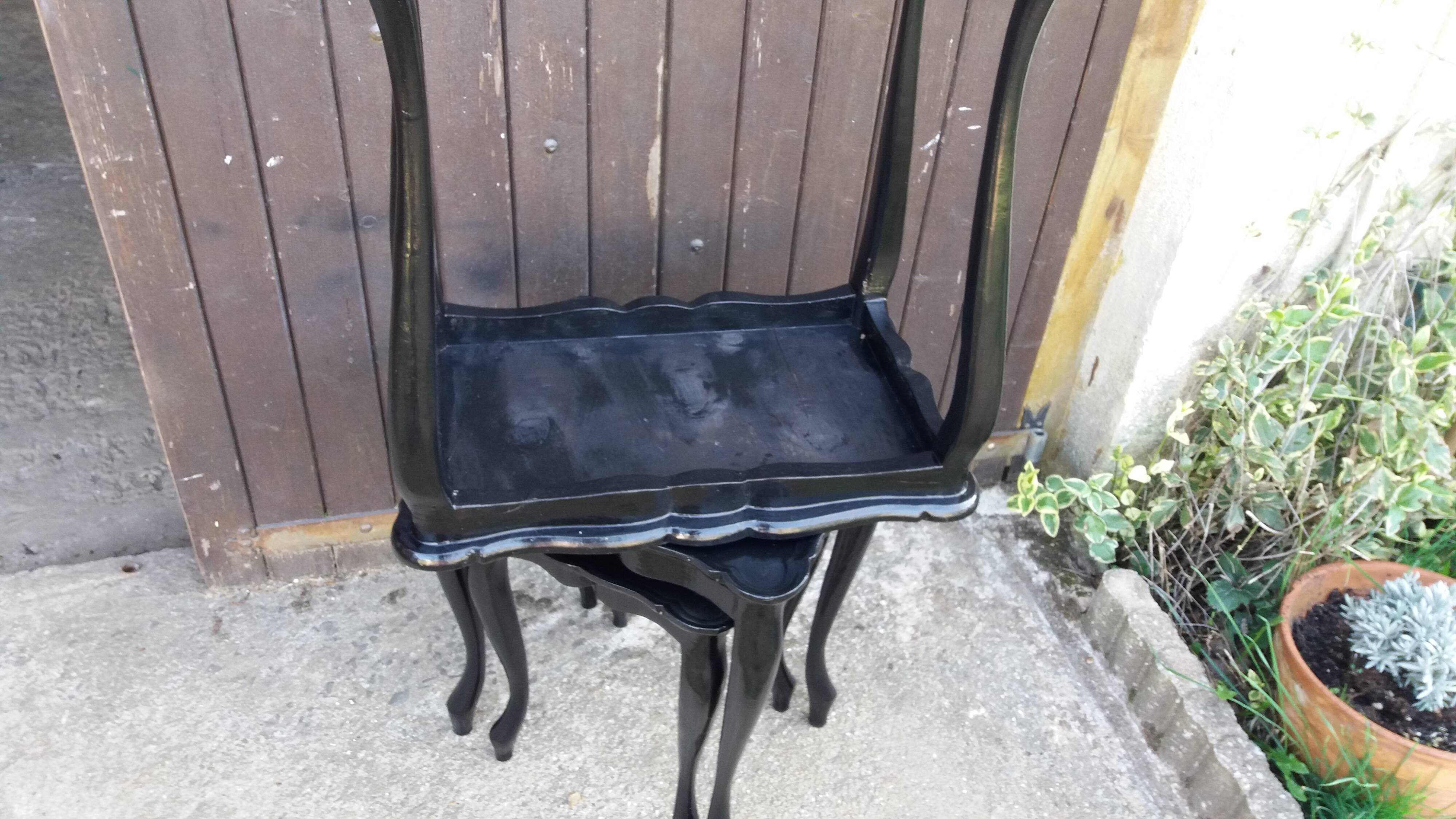 Set of 3 black nesting tables.