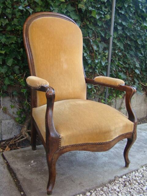 Old walnut Voltaire armchair