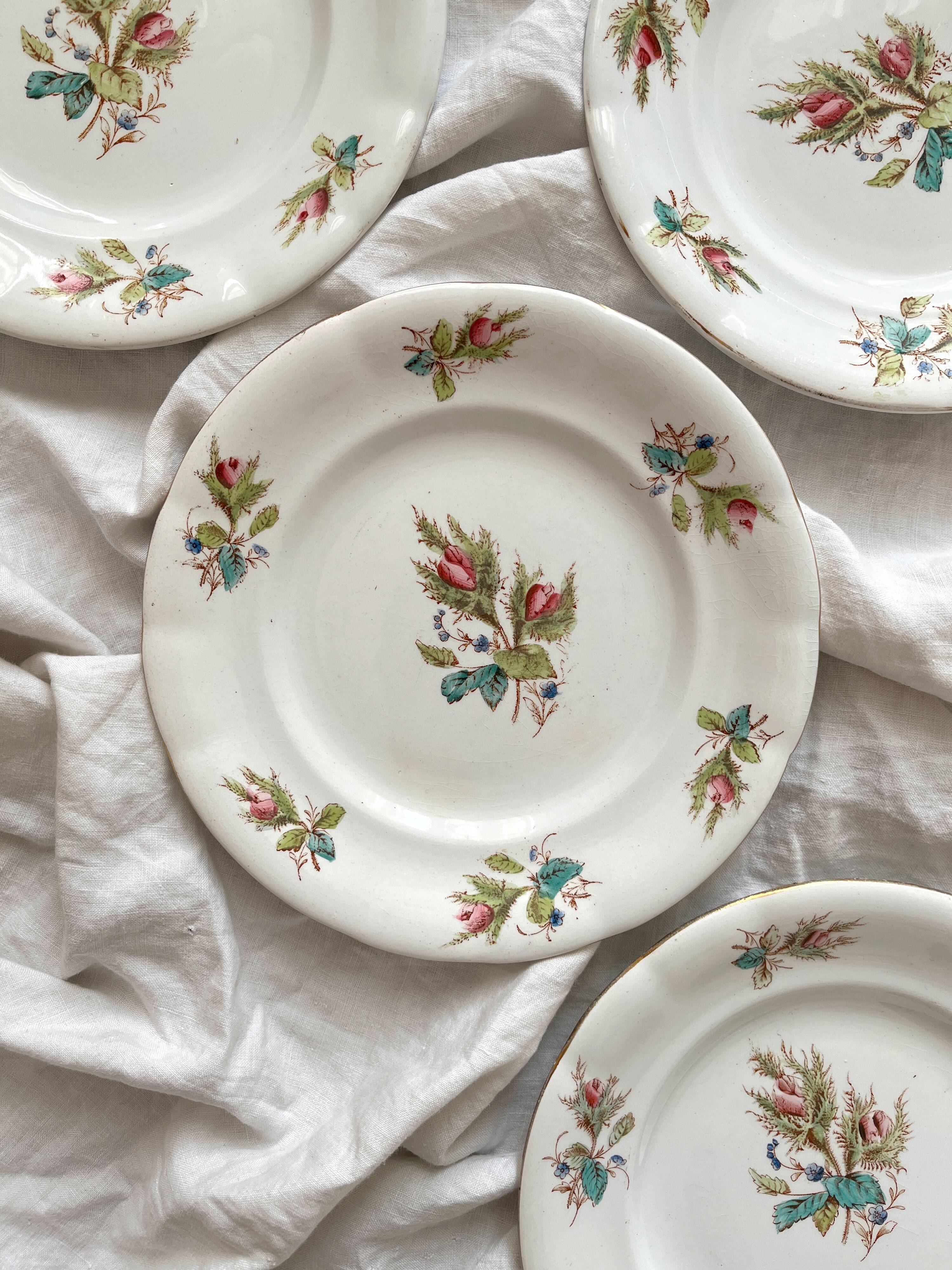 4 polychrome ironstone dessert plates with flowers, KG Lunéville
