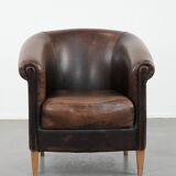 Characterful club armchair made of sheepskin with a beautiful patina