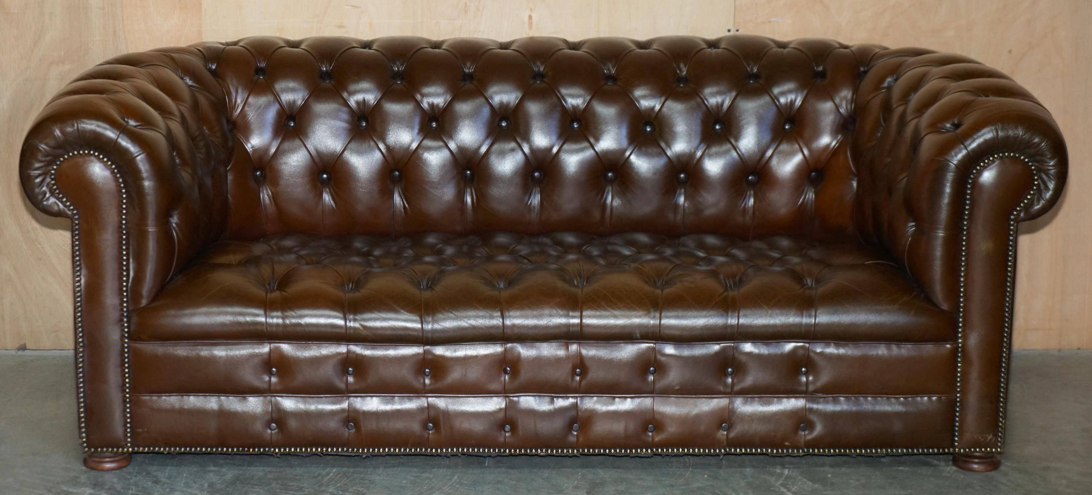 Restored Chesterfield leather sofa in vintage Art Deco style