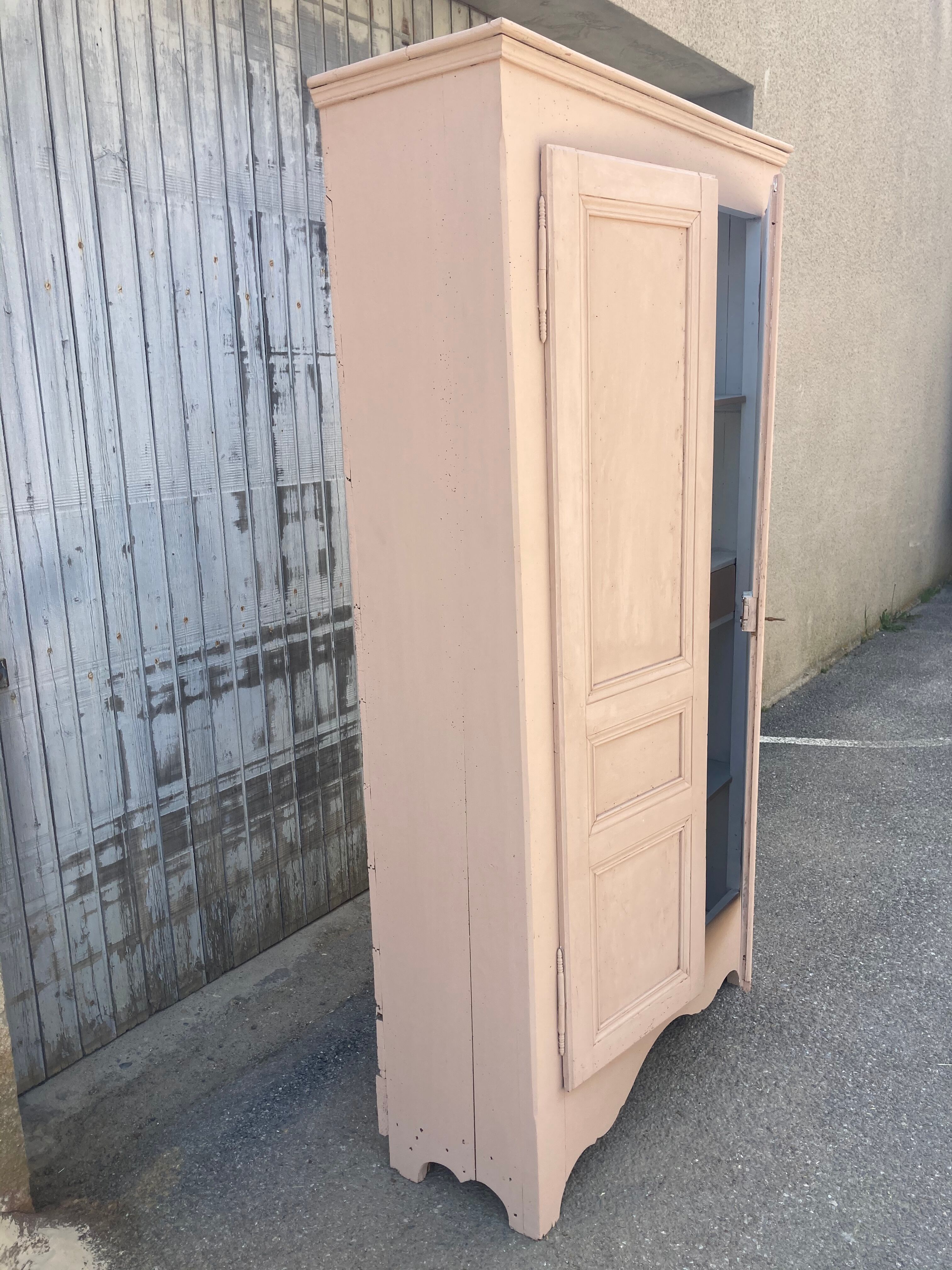 Painted cupboard made of solid wood