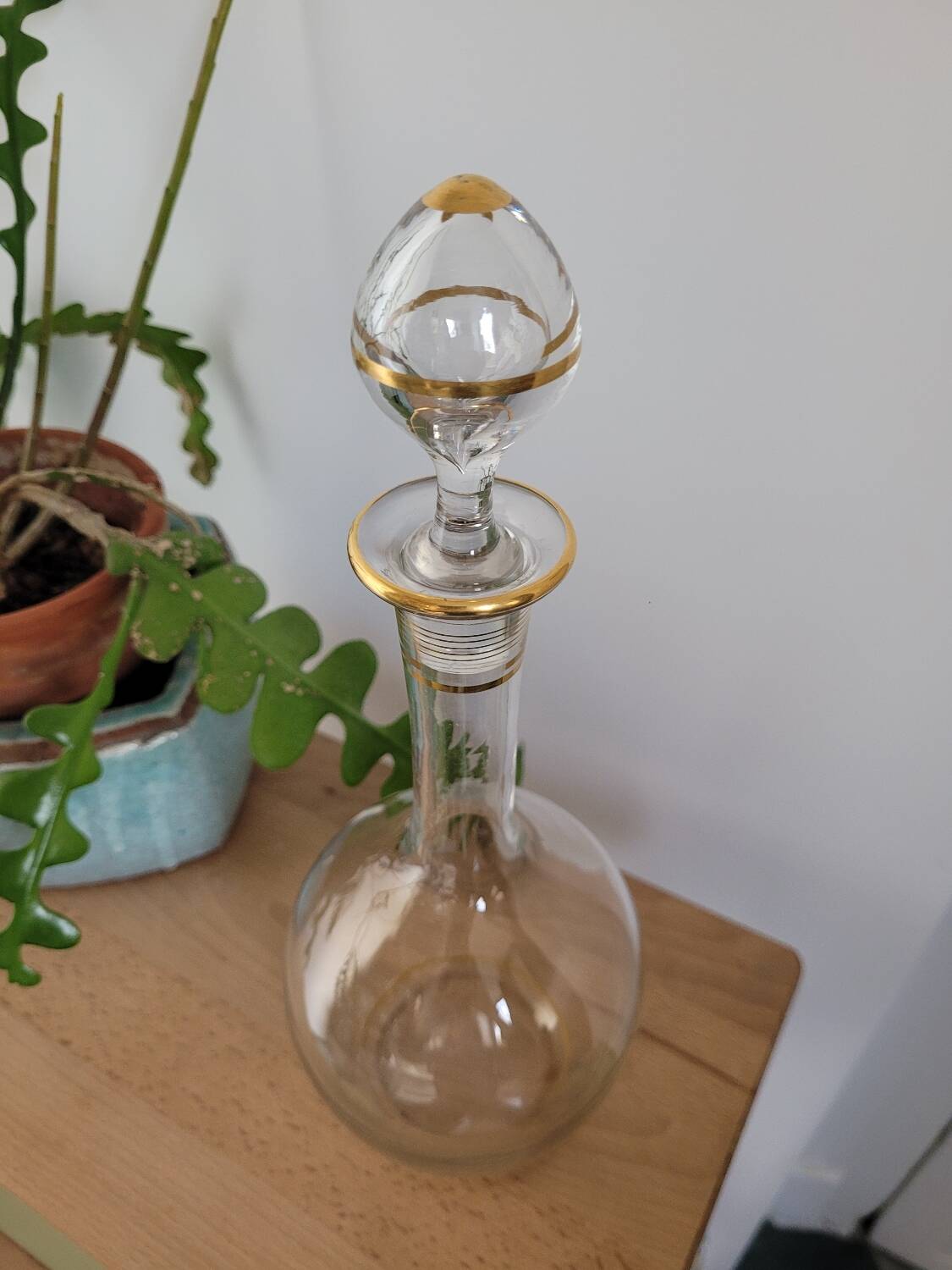 Glass carafe with gold trim
