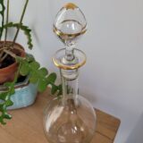 Glass carafe with gold trim