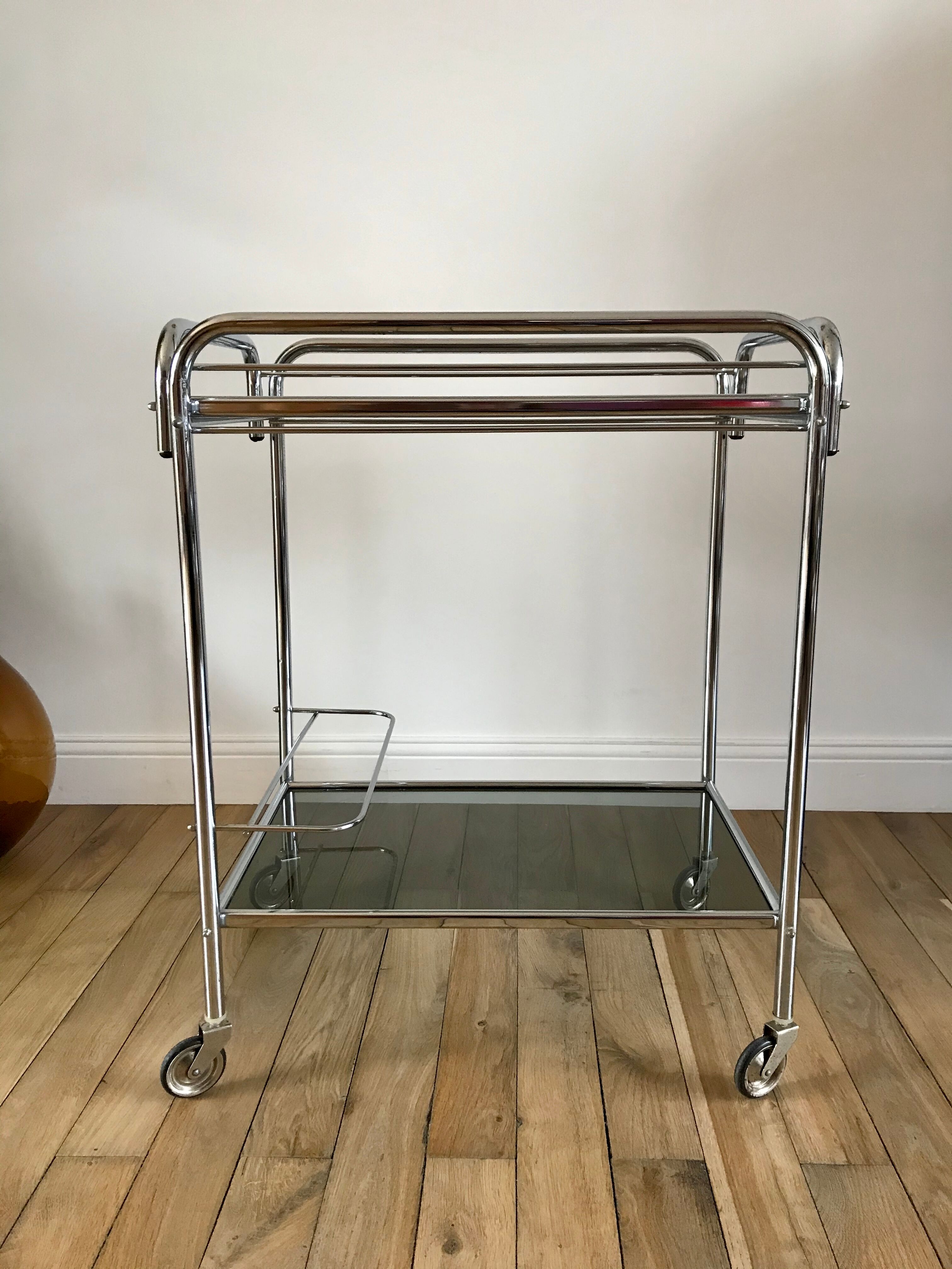 Serving in chrome steel and smoked glass 70s