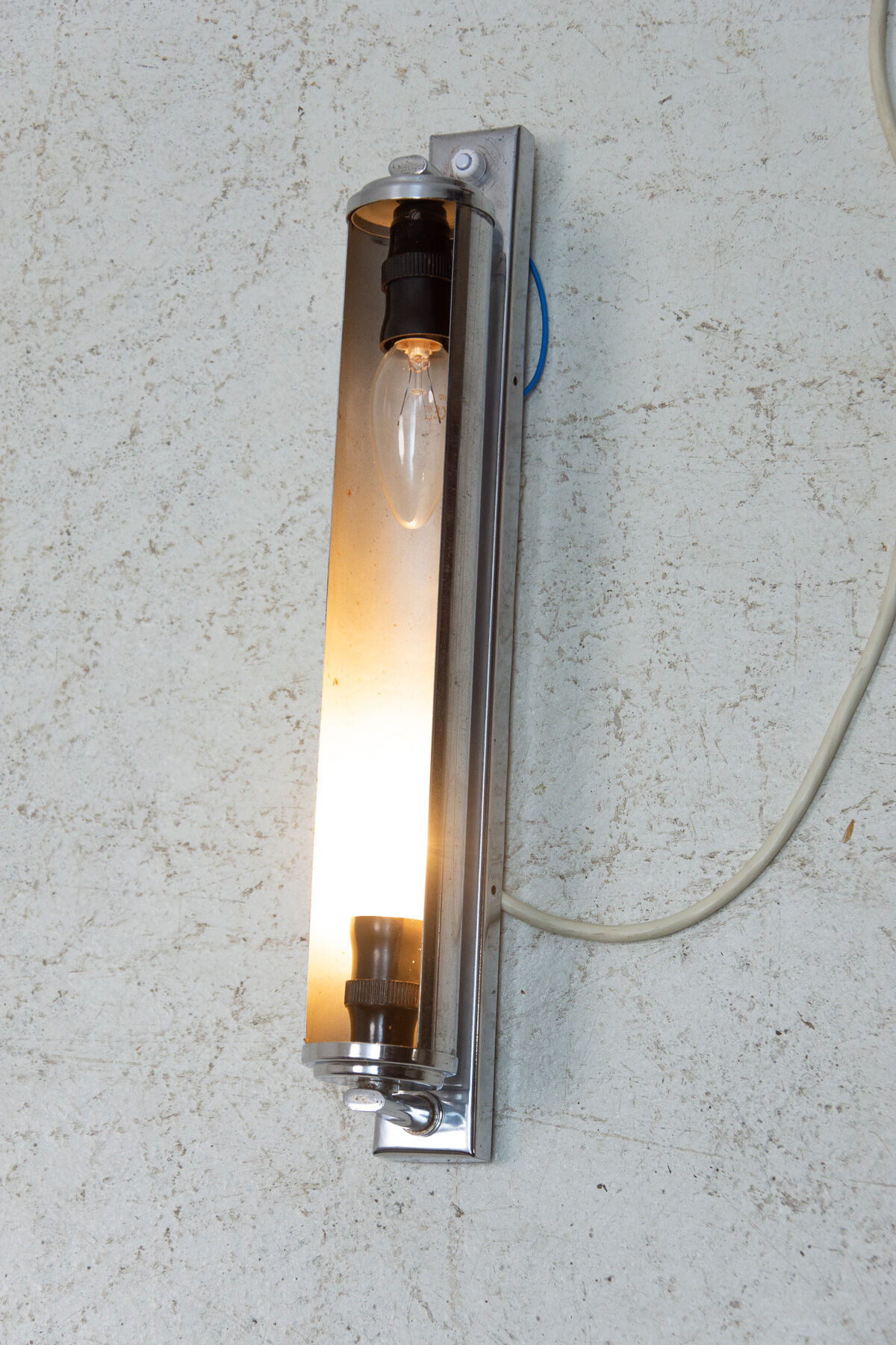 Bauhaus chromium plated wall lamp for Napako, 1940