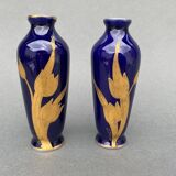 Pair of 1900 Limoges vases with blue background and gold highlights, R. Rosier decorations