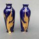 Pair of 1900 Limoges vases with blue background and gold highlights, R. Rosier decorations