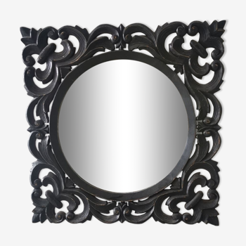 Carved mirror zn black patinated wood
