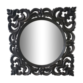 Carved mirror zn black patinated wood