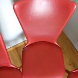 Baumann skai red imitation leather chairs from the 1950s