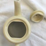 "Selfish" cream-colored teapot