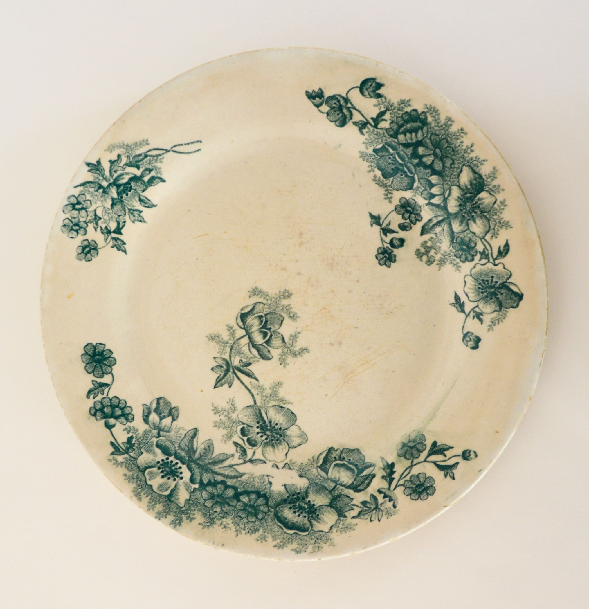 4 flat plates "Anemones" iron earth