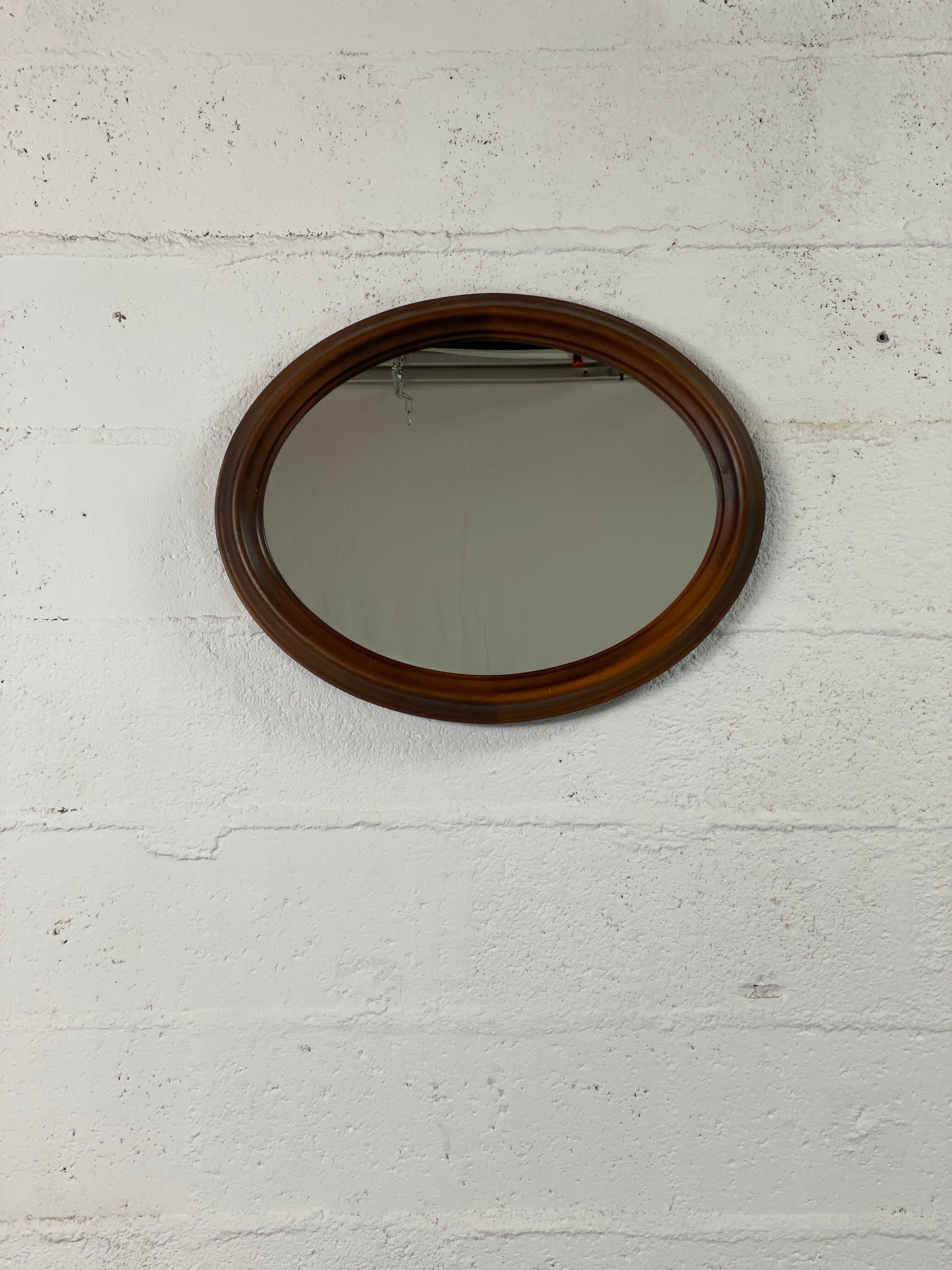 Oval wooden mirror