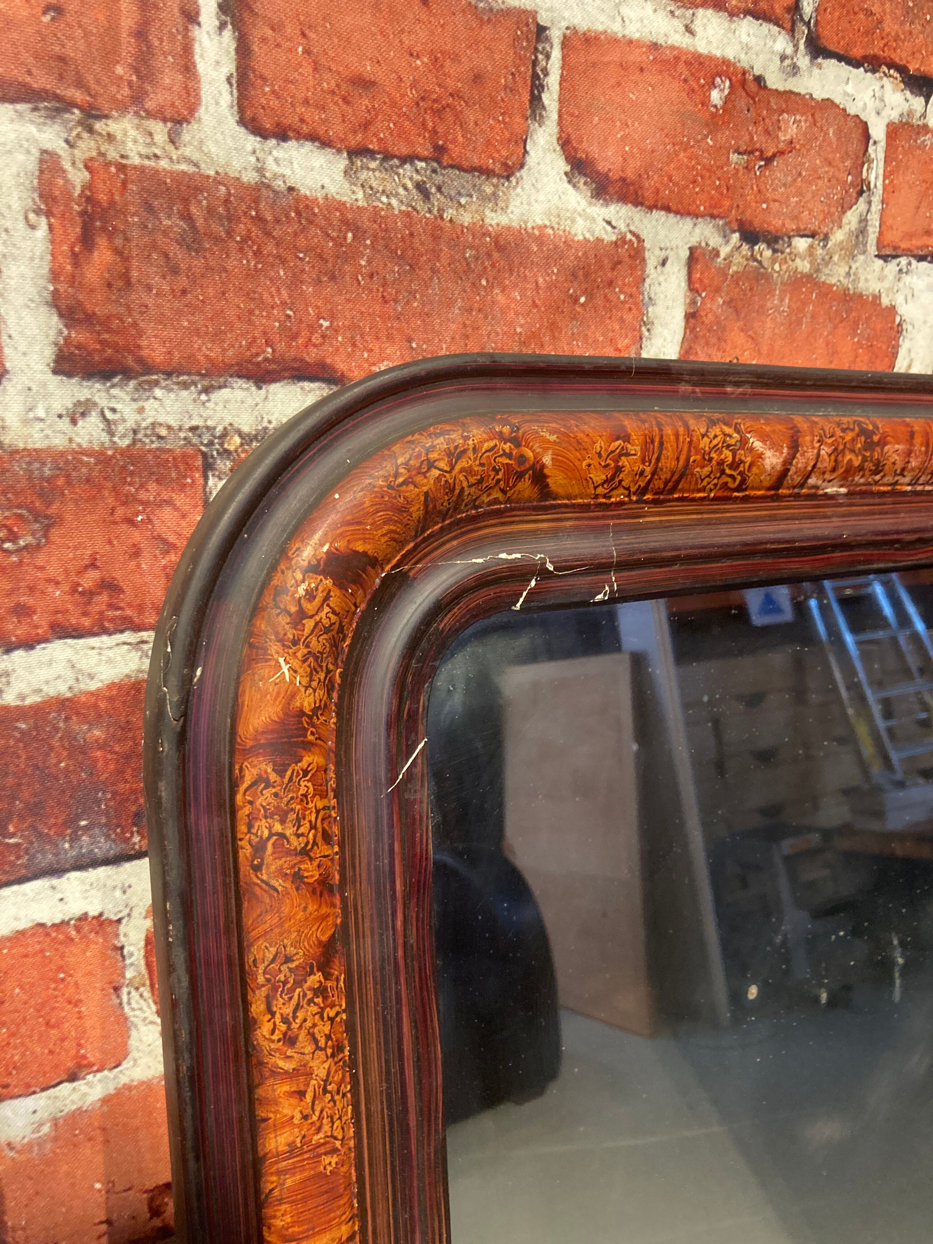 Mirror with wooden frame