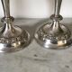 Pair of silver metal candlesticks