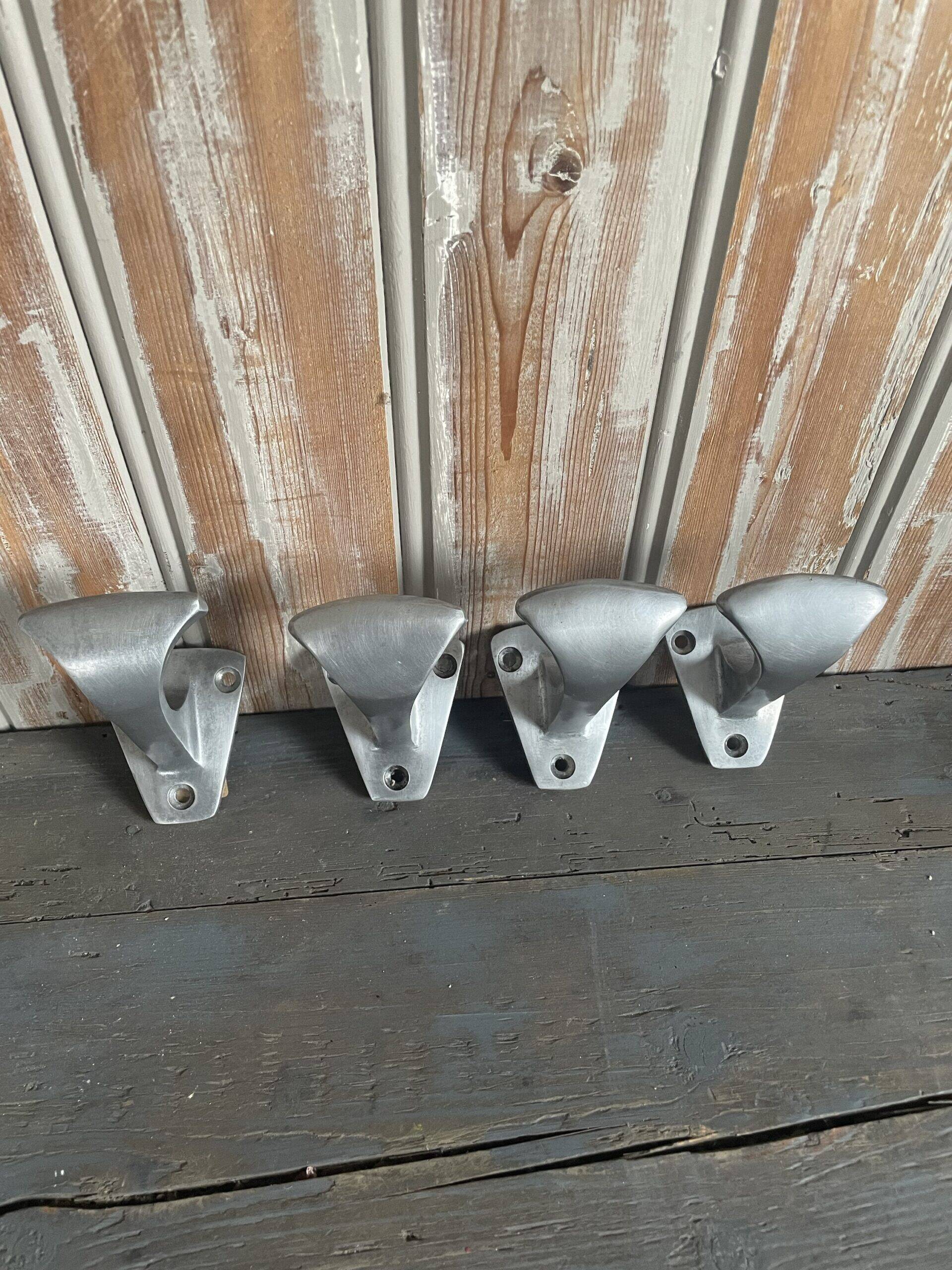 4 metal coat hooks, 1950s