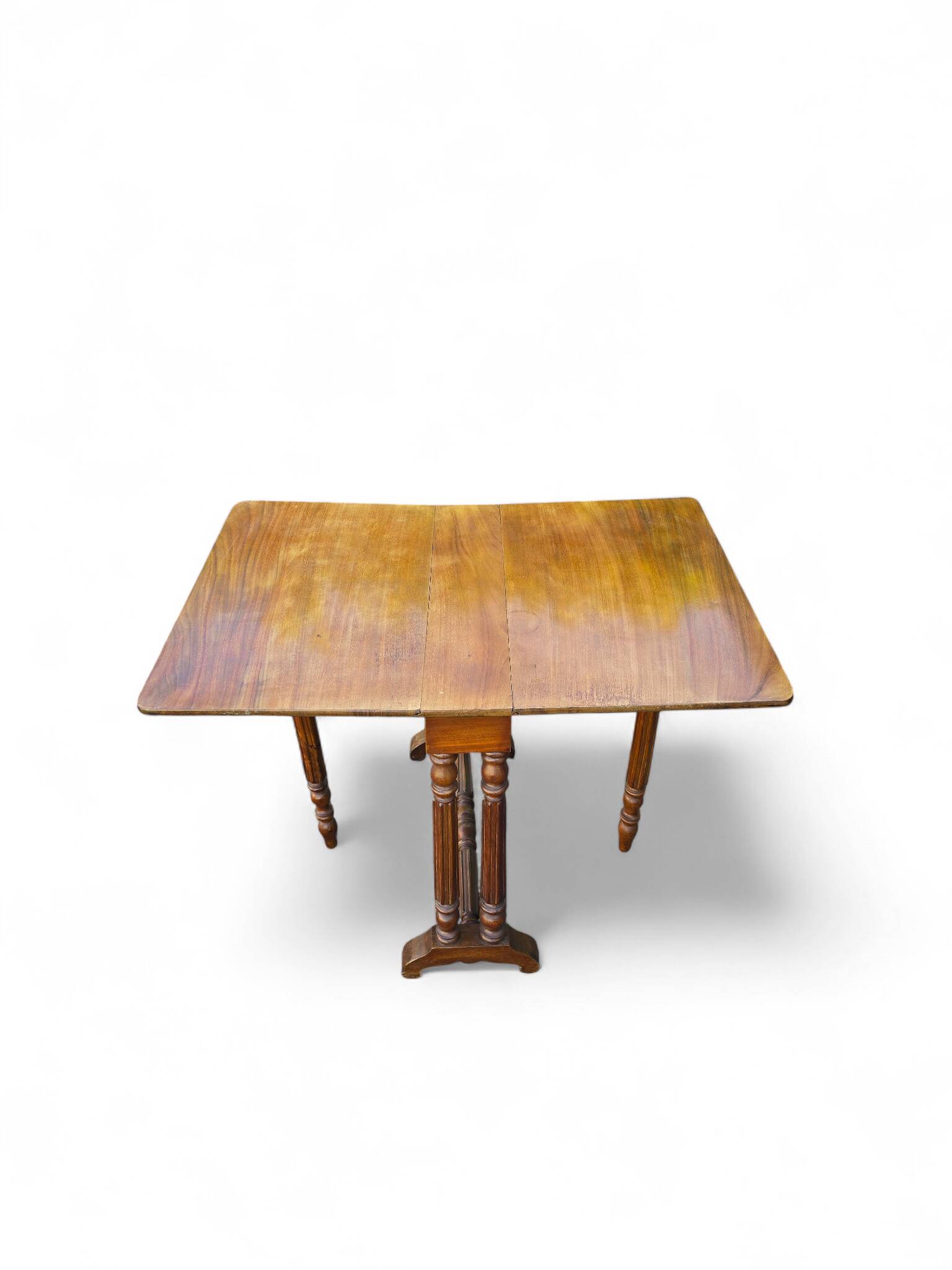 “Gateleg” folding walnut table