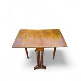 “Gateleg” folding walnut table