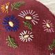 Paire de coussins ronds vintage en lin brodé