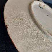 Assiette en barbotine poire en relief fin XIXème début XXème