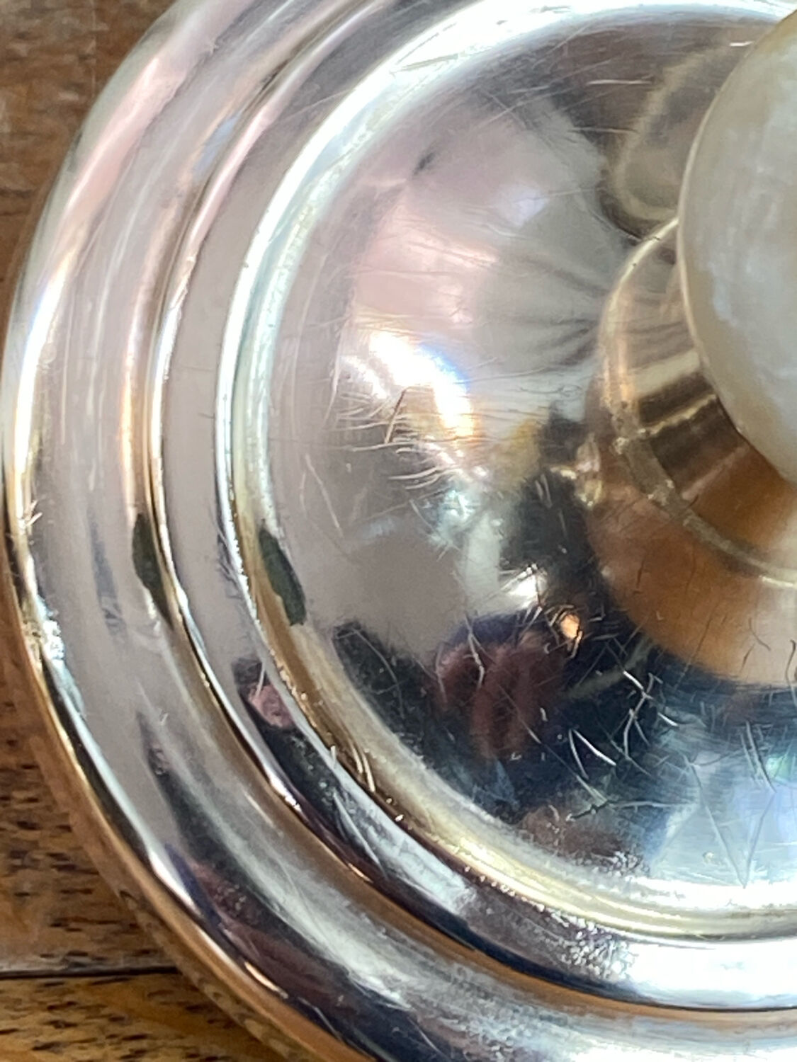 Pair of brass and stone candlesticks