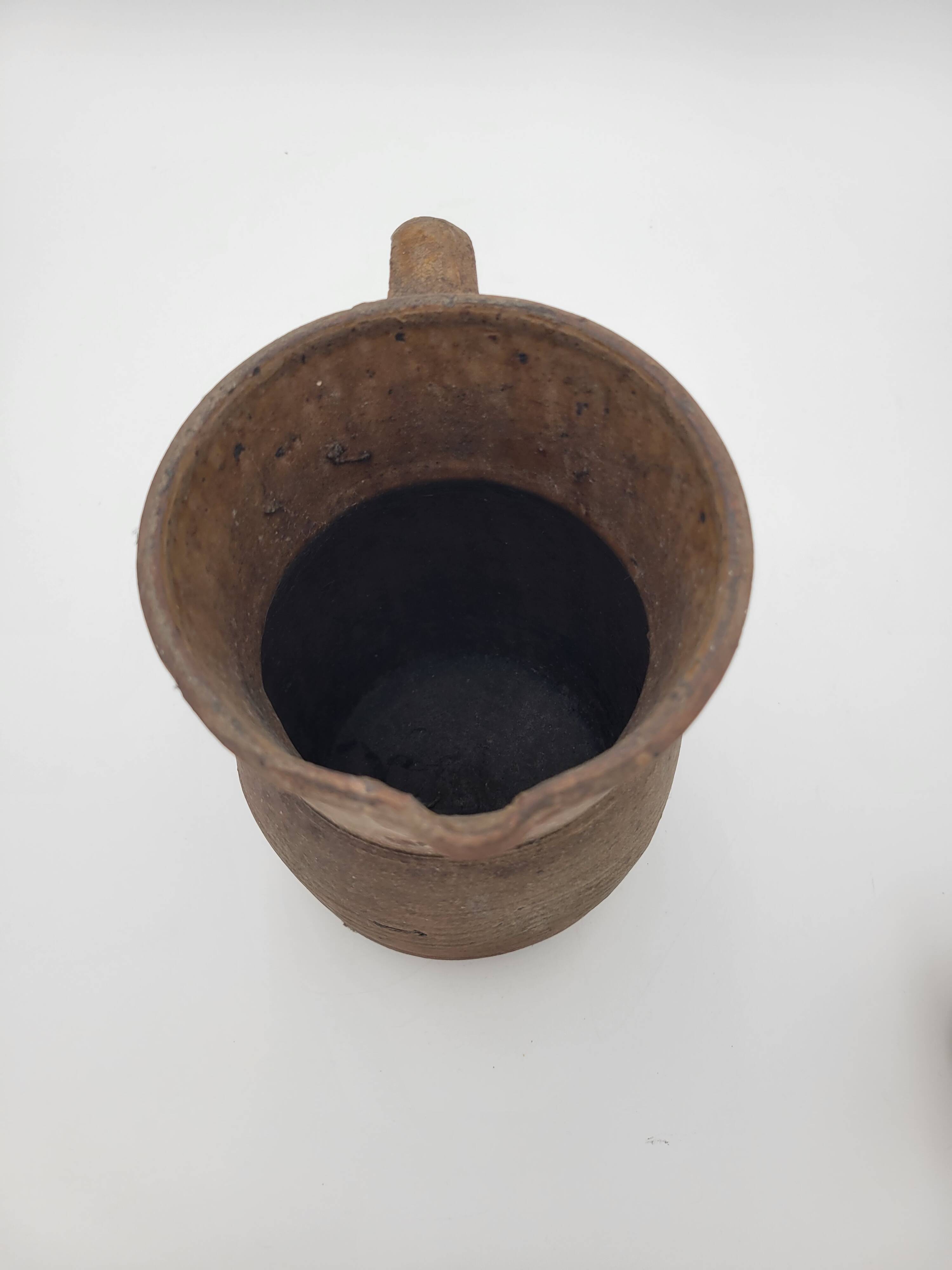 Pair of old terracotta pitchers